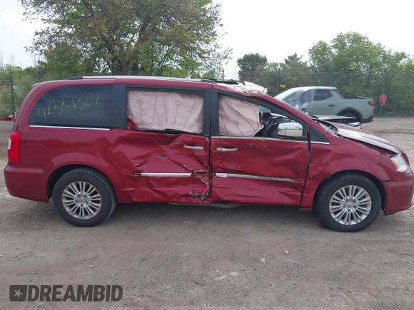 2014 Chrysler Town & Country Limited z VIN 2C4RC1GG2ER234306, wystawiony jako IAAI lot #42331502 z przebiegiem Nie podano mil oraz . Historia ofert i sprzedaży dostępna na DreamBid. Obrazek 14.