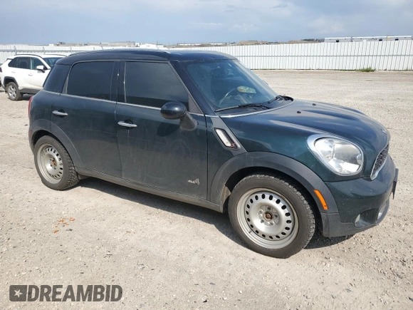 2012 MINI Countryman S with VIN WMWZC5C54CWL57554, listed as a Copart auction lot 59699865 with 144,737 mi miles and Salvage title. Bid and sale history available at DreamBid. Image 4.