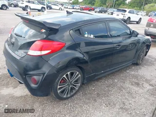 2016 Hyundai Veloster Turbo with VIN KMHTC6AE1GU271374, listed as a IAAI auction lot 41924768 with 93,072 mi miles. Bid and sale history available at carsss.com. Image 4.