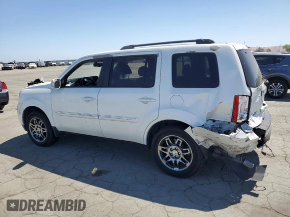 2013 Honda Pilot Touring with VIN 5FNYF4H95DB016049, listed as a Copart auction lot 61012725 with 104,252 mi miles and Salvage title. Bid and sale history available at DreamBid. Image 2.