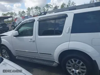 2012 Nissan Pathfinder SV with VIN 5N1AR1NN1CC616194, listed as a IAAI auction lot 40821219 with 104,698 mi miles. Bid and sale history available at carsss.com. Image 14.