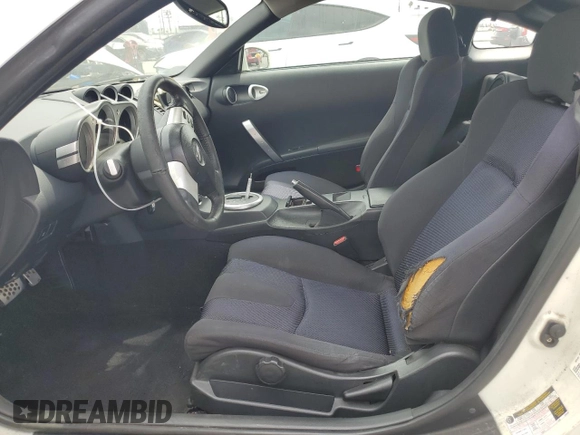 2004 Nissan 350Z Touring with VIN JN1AZ34D74T160909, listed as a Copart auction lot 58302075 with 54,100 mi miles and Salvage title. Bid and sale history available at DreamBid. Image 7.
