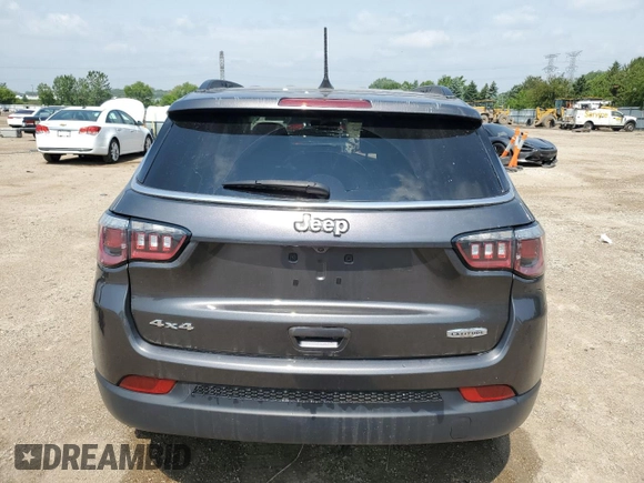 2018 Jeep Compass Altitude с VIN 3C4NJDBB5JT114847, выставлен на аукционе Copart как лот 59864675 с пробегом 123 036 миль миль и Списание • Salvage title. История ставок и продаж доступна на DreamBid. Изображение 6.