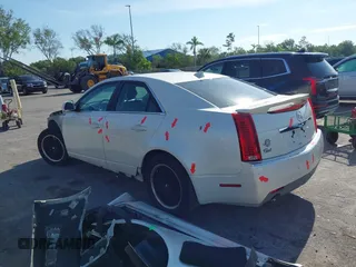 2009 Cadillac CTS RWD z VIN 1G6DF577190106800, wystawiony jako IAAI lot #42316470 z przebiegiem 147 836 mil mil oraz . Historia ofert i sprzedaży dostępna na DreamBid. Obrazek 3.
