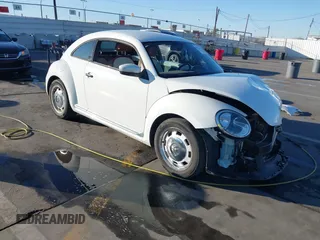 2015 Volkswagen Beetle Fleet Edition with VIN 3VWF17AT2FM604838, listed as a IAAI auction lot 40814174 with Not provided miles and . Bid and sale history available at DreamBid. Image 1.