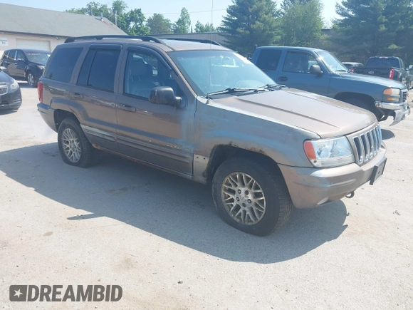 2002 Jeep Grand Cherokee Limited z VIN 1J8GW58N62C213751, wystawiony jako IAAI lot #42478869 z przebiegiem 233 848 mil mil oraz . Historia ofert i sprzedaży dostępna na DreamBid. Obrazek 1.