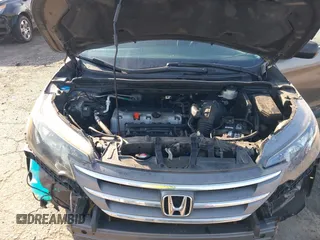 2013 Honda CR-V LX with VIN 3CZRM3H31DG703436, listed as a IAAI auction lot 42702584 with 140,013 mi miles and . Bid and sale history available at DreamBid. Image 10.