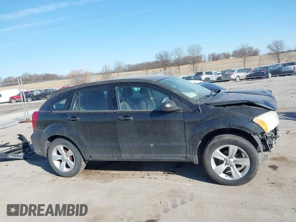 2010 Dodge Caliber SXT with VIN 1B3CB4HA4AD651946, listed as a IAAI auction lot 41771139 with 165,663 mi miles and . Bid and sale history available at DreamBid. Image 14.
