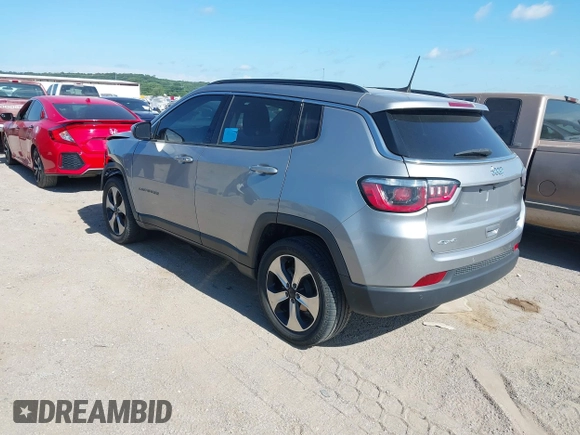 2017 Jeep Compass Latitude with VIN 3C4NJDBBXHT656407, listed as a IAAI auction lot 42562826 with 78,057 mi miles and . Bid and sale history available at DreamBid. Image 3.