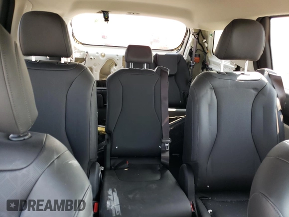 2023 Kia Carnival LX with VIN KNDNB4H35P6260181, listed as a Copart auction lot 74240714 with 6,879 mi miles and Salvage Title. Bid and sale history available at carsss.com. Image 10.