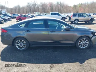 2017 Ford Fusion SE with VIN 3FA6P0H75HR401388, listed as a IAAI auction lot 41868407 with 147,102 mi miles and . Bid and sale history available at DreamBid. Image 13.