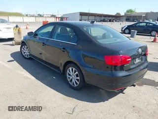 2014 Volkswagen Jetta Sedan SE w/Connectivity/Sunroof PZEV with VIN 3VWD17AJ8EM434456, listed as a IAAI auction lot 42099297 with 92,773 mi miles. Bid and sale history available at carsss.com. Image 3.
