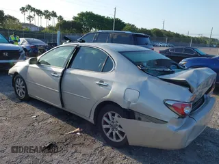 2003 Lexus ES with VIN JTHBF30G730134027, listed as a IAAI auction lot 42016954 with 99,751 mi miles. Bid and sale history available at carsss.com. Image 3.