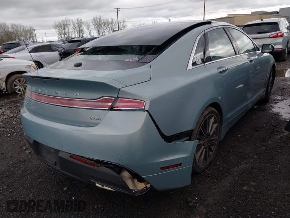 2014 Lincoln MKZ Hybrid with VIN 3LN6L2LU2ER813239, listed as a IAAI auction lot 42191138 with 126,082 mi miles and . Bid and sale history available at DreamBid. Image 4.
