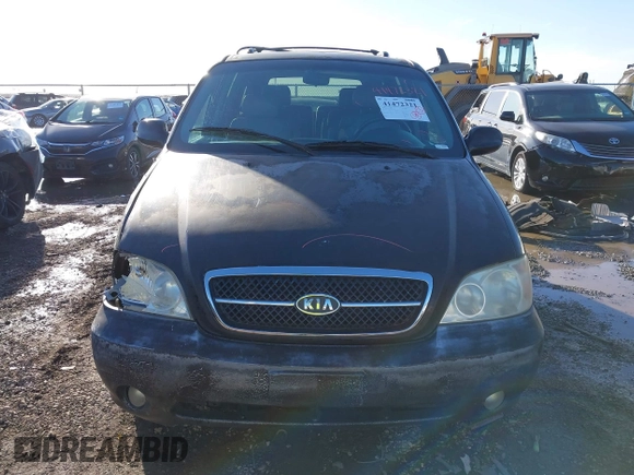 2004 Kia Sedona LX with VIN KNDUP131X46601278, listed as a IAAI auction lot 41472321 with 202,212 mi miles. Bid and sale history available at carsss.com. Image 13.
