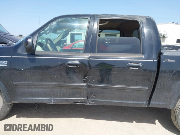 2003 Ford F-150 XLT with VIN 1FTRW07L53KC01651, listed as a IAAI auction lot 41827007 with 233,842 mi miles and . Bid and sale history available at DreamBid. Image 14.