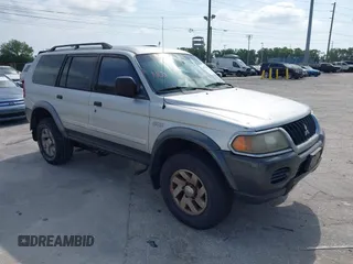 2003 Mitsubishi Montero Sport XLS with VIN JA4MT31R03J023679, listed as a IAAI auction lot 41872682 with 148,365 mi miles. Bid and sale history available at carsss.com. Image 1.