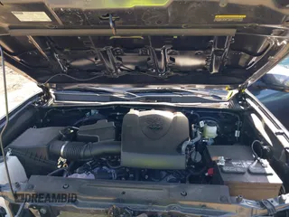 2023 Toyota Tacoma SR with VIN 3TMCZ5AN0PM614127, listed as a IAAI auction lot 41974924 with 12,674 mi miles and . Bid and sale history available at DreamBid. Image 10.