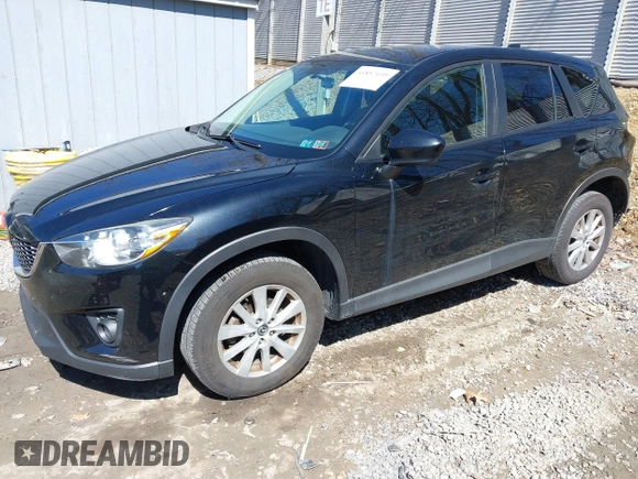 2014 Mazda CX-5 Touring with VIN JM3KE4CY8E0333029, listed as a IAAI auction lot 41857199 with 218,887 mi miles. Bid and sale history available at carsss.com. Image 2.