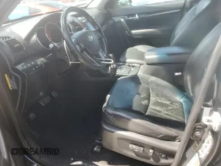 2012 Kia Sorento SX z VIN 5XYKW4A28CG193611, wystawiony jako Copart lot #57659935 z przebiegiem 203 349 mil mil oraz Szkoda całkowita • Salvage title. Historia ofert i sprzedaży dostępna na DreamBid. Obrazek 7.