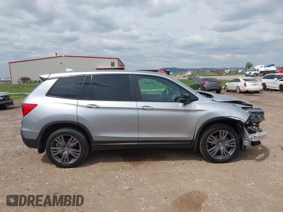 2020 Honda Passport EX-L with VIN 5FNYF8H59LB014260, listed as a IAAI auction lot 42274421 with 111,830 mi miles and . Bid and sale history available at DreamBid. Image 14.