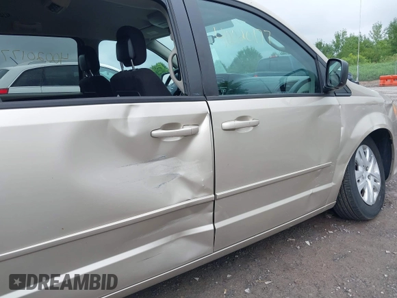 2014 Dodge Grand Caravan American Value with VIN 2C4RDGBGXER197092, listed as a IAAI auction lot 40020177 with 25,192 mi miles and . Bid and sale history available at DreamBid. Image 6.