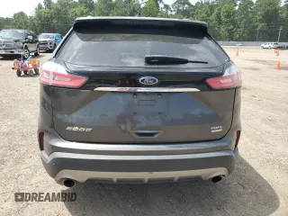 2020 Ford Edge SEL с VIN 2FMPK3J92LBA30123, выставлен на аукционе Copart как лот 63192805 с пробегом 119 534 миль миль и Списание • Salvage title. История ставок и продаж доступна на DreamBid. Изображение 6.