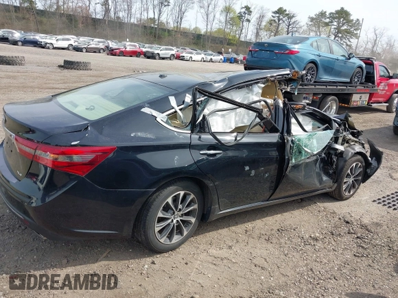 2016 Toyota Avalon Limited with VIN 4T1BK1EB6GU207669, listed as a IAAI auction lot 42122285 with 27,012 mi miles and . Bid and sale history available at carsss.com. Image 12.