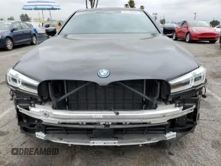 2023 BMW 5 Series 530e with VIN WBA13AG01PCM24624, listed as a Copart auction lot 55149855 with 26,022 mi miles and Salvage title. Bid and sale history available at DreamBid. Image 5.