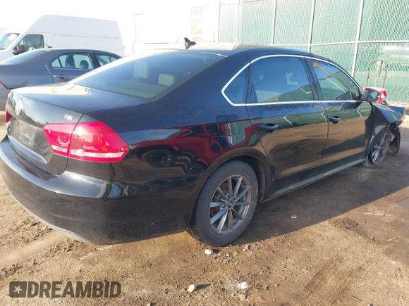 2015 Volkswagen Passat 1.8T Limited Edition with VIN 1VWAT7A37FC075800, listed as a IAAI auction lot 41856654 with 130,139 mi miles. Bid and sale history available at carsss.com. Image 4.