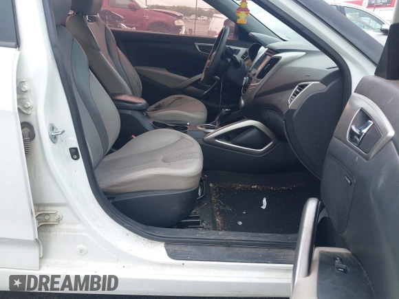 2012 Hyundai Veloster w/Gray Int с VIN KMHTC6ADXCU074298, выставлен на аукционе IAAI как лот 42353923 с пробегом 129 114 миль миль и . История ставок и продаж доступна на DreamBid. Изображение 5.