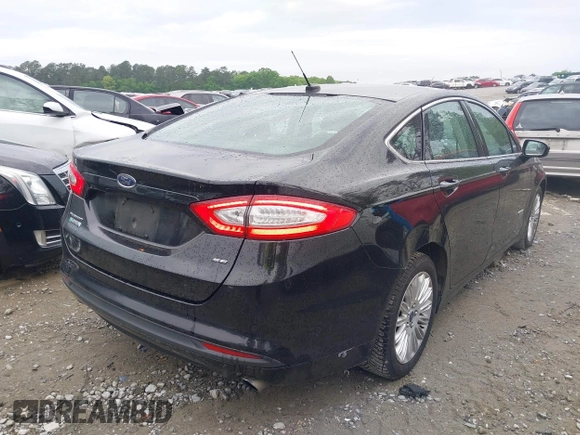 2016 Ford Fusion Energi SE Luxury with VIN 3FA6P0PU7GR293099, listed as a IAAI auction lot 42079873 with 194,755 mi miles. Bid and sale history available at carsss.com. Image 4.