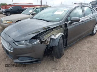 2016 Ford Fusion S z VIN 3FA6P0G72GR132394, wystawiony jako IAAI lot #42142780 z przebiegiem 66 013 mil mil oraz . Historia ofert i sprzedaży dostępna na DreamBid. Obrazek 6.