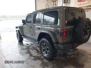 2021 Jeep Wrangler Unlimited Rubicon z VIN 1C4JJXR65MW675010, wystawiony jako IAAI lot #41990021 z przebiegiem 73 406 mil mil oraz . Historia ofert i sprzedaży dostępna na DreamBid. Obrazek 3.