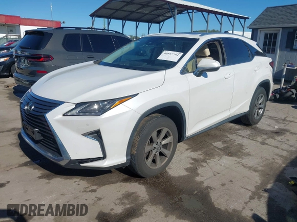 2019 Lexus RX with VIN JTJBZMCA0K2041369, listed as a IAAI auction lot 40557791 with 51,524 mi miles. Bid and sale history available at carsss.com. Image 18.