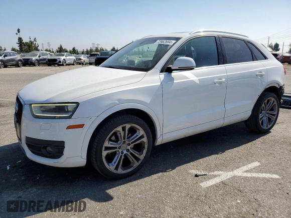 2015 Audi Q3 Premium Plus with VIN WA1BFCFS0FR001987, listed as a Copart auction lot 72962684 with 104,432 mi miles and Salvage title. Bid and sale history available at DreamBid. Image 1.
