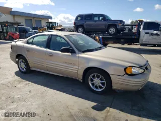 2001 Pontiac Grand Am SE with VIN 1G2NE52T91M583582, listed as a Copart auction lot 77808974 with 126,219 mi miles and Salvage Title. Bid and sale history available at carsss.com. Image 4.