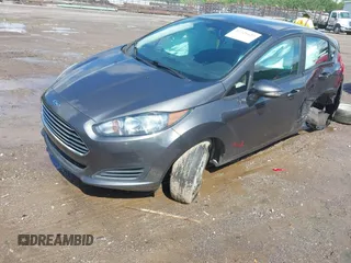 2019 Ford Fiesta SE z VIN 3FADP4EJ9KM125252, wystawiony jako IAAI lot #42221622 z przebiegiem 57 366 mil mil oraz . Historia ofert i sprzedaży dostępna na DreamBid. Obrazek 2.