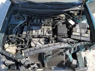 1999 Mazda 626 ES with VIN 1YVGF22C1X5896686, listed as a Copart auction lot 72012584 with 123,672 mi miles and Salvage Title. Bid and sale history available at carsss.com. Image 13.