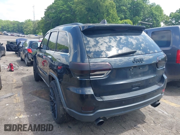 2014 Jeep Grand Cherokee Limited with VIN 1C4RJFBG3EC545861, listed as a IAAI auction lot 42216743 with 160,000 mi miles and . Bid and sale history available at DreamBid. Image 3.