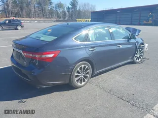 2016 Toyota Avalon Hybrid XLE Premium with VIN 4T1BD1EB2GU052127, listed as a IAAI auction lot 41737260 with 266,841 mi miles. Bid and sale history available at carsss.com. Image 4.
