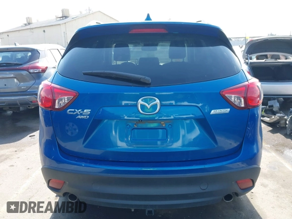 2014 Mazda CX-5 Grand Touring with VIN JM3KE4DY1E0327703, listed as a IAAI auction lot 41755735 with 206,845 mi miles. Bid and sale history available at carsss.com. Image 16.