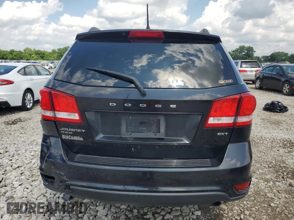 2013 Dodge Journey SXT with VIN 3C4PDDBG0DT532765, listed as a Copart auction lot 61481335 with 193,066 mi miles and Salvage title. Bid and sale history available at DreamBid. Image 6.