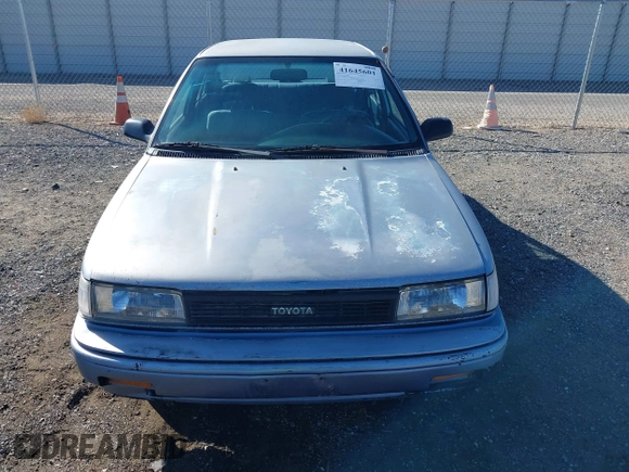 1989 Toyota Corolla with VIN JT2AE92E6K3221552, listed as a IAAI auction lot 41645601 with 634,636 mi miles and . Bid and sale history available at DreamBid. Image 6.