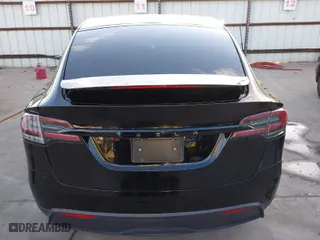 2023 Tesla Model X with VIN 7SAXCDE55PF387015, listed as a IAAI auction lot 41669549 with 1 mi miles. Bid and sale history available at carsss.com. Image 16.