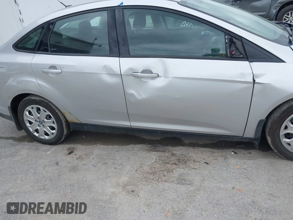 2012 Ford Focus SE with VIN 1FAHP3F27CL127751, listed as a IAAI auction lot 42271004 with 167,478 mi miles and . Bid and sale history available at DreamBid. Image 6.