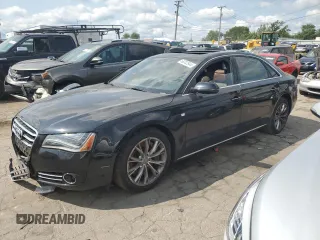 2011 Audi A8 z VIN WAURVAFD9BN005595, wystawiony jako Copart lot #66302644 z przebiegiem 106 610 mil mil oraz Nie do naprawy. Historia ofert i sprzedaży dostępna na DreamBid. Obrazek 1.