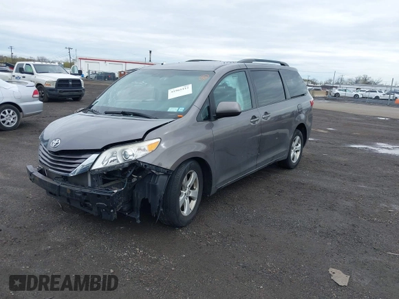 2015 Toyota Sienna LE AAS with VIN 5TDKK3DC1FS615090, listed as a IAAI auction lot 41965112 with 116,745 mi miles. Bid and sale history available at carsss.com. Image 17.
