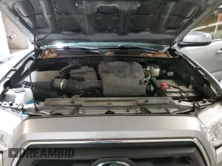 2021 Toyota Tacoma 4WD SR5 with VIN 3TMDZ5BN3MM103509, listed as a Copart auction lot 48461875 with 54,566 mi miles and Salvage Title. Bid and sale history available at carsss.com. Image 11.
