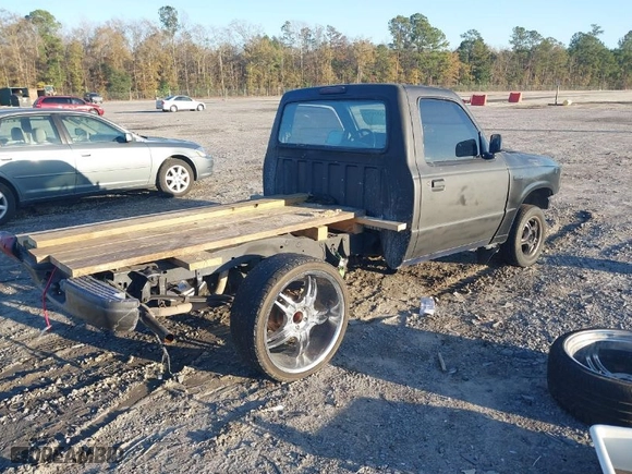 1997 Mazda B-Series 2WD Truck with VIN 4F4CR12A6VTM06442, listed as a IAAI auction lot 41229989 with NaN miles. Bid and sale history available at carsss.com. Image 4.